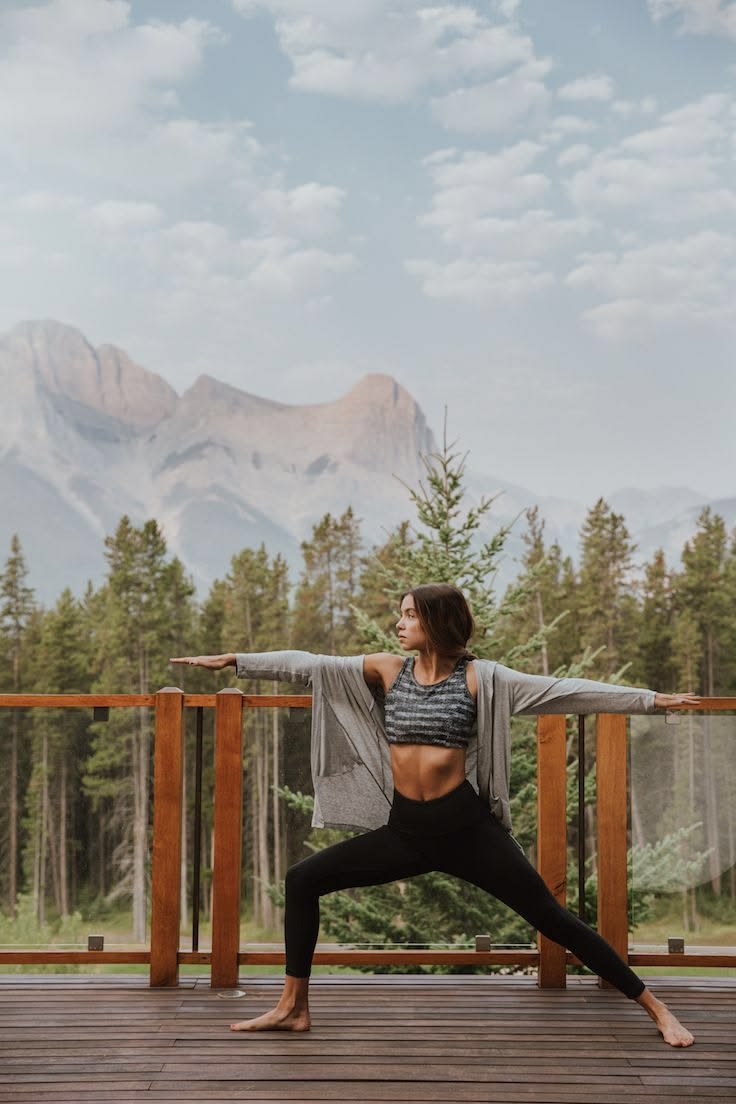 Stylised person exercising in a compact living room setting